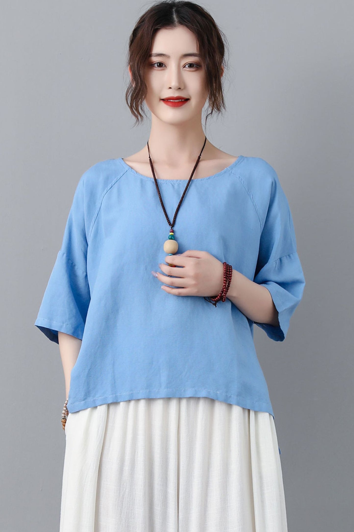 Loose fitting blue linen blouse C2302