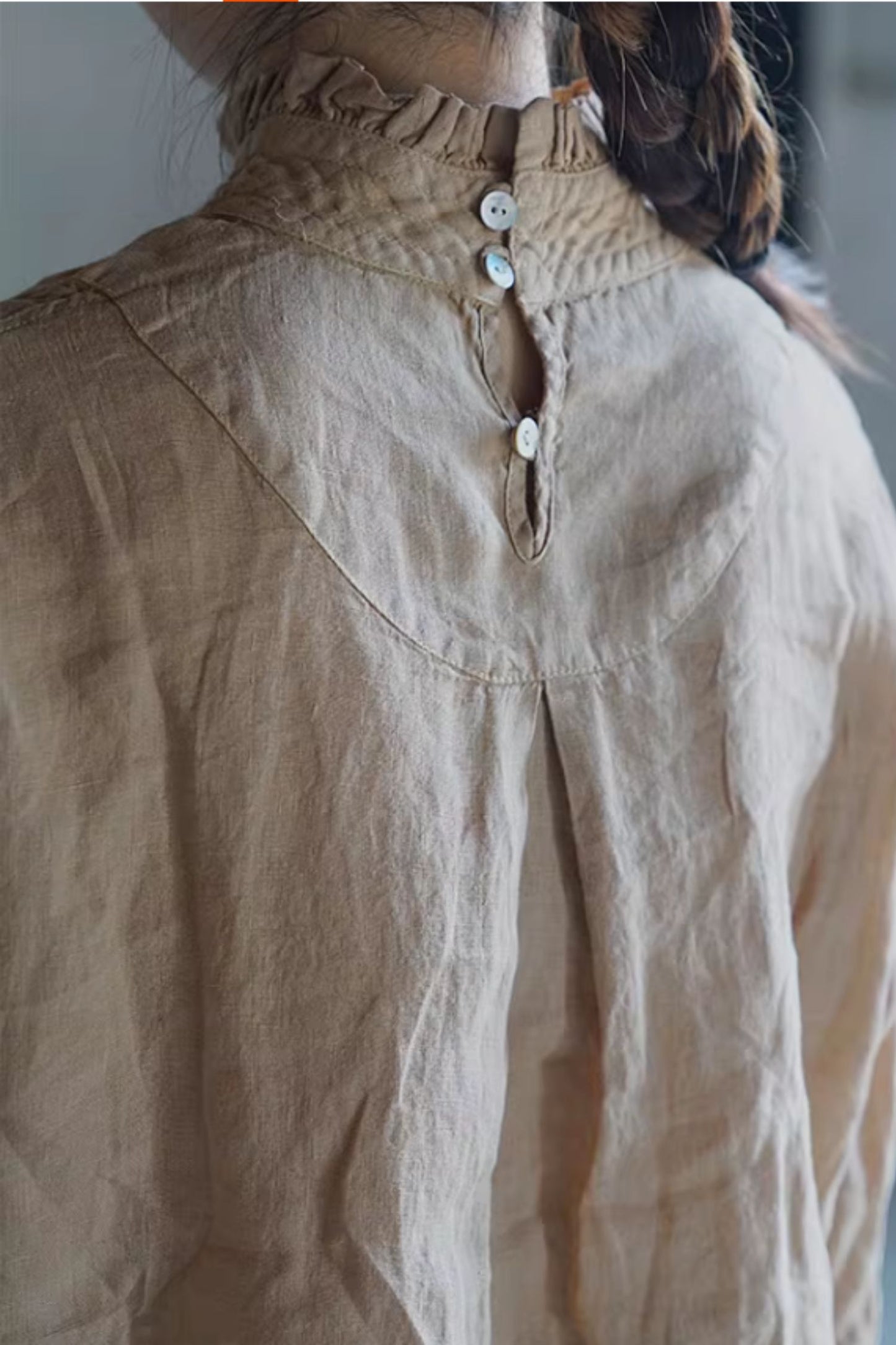 loose fitting linen blouse with ruffle details C5433