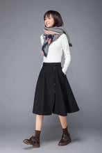 Load image into Gallery viewer, winter skirt, wool skirt, midi skirt, skirt with pockets, black skirt, swing skirt, button skirt, womens skirt, handmade skirt, skirt c1226
